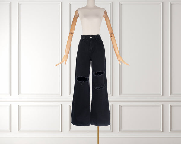 Zerrissene Jeans mit weitem Bein